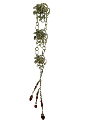 gold rose chain hair accessory with red crystal drop strands front view
