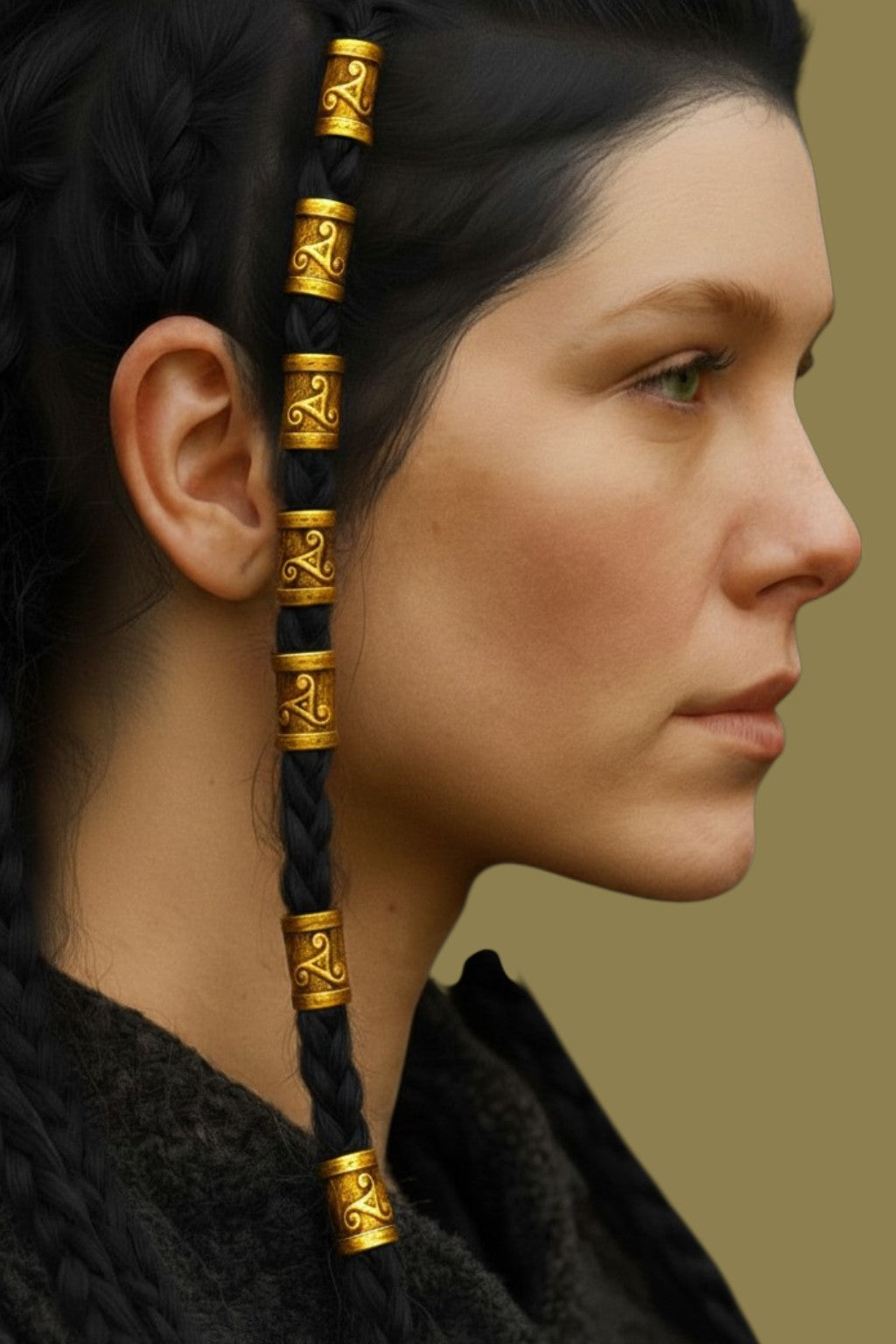 Gold Celtic hair beads worn by a model in braided hair, featuring decorative metal beads for braids and locs.