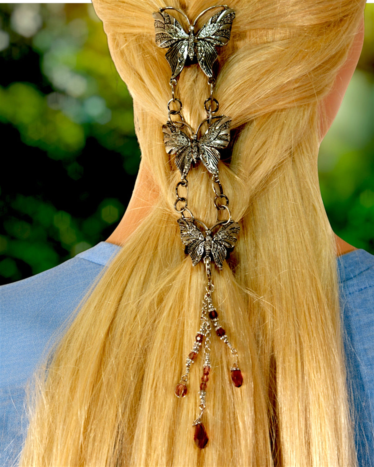 Butterfly Hair Armor worn in a half-up hairstyle with cascading butterfly design and dangling crystal beads