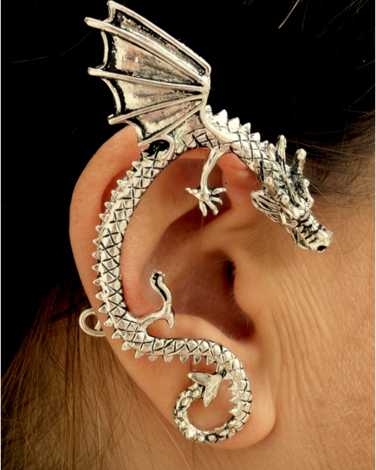 Model wearing Silver Dragon Elf Cuff with Wings on outer ear, non-piercing fantasy ear cuff featuring detailed dragon and wing design.