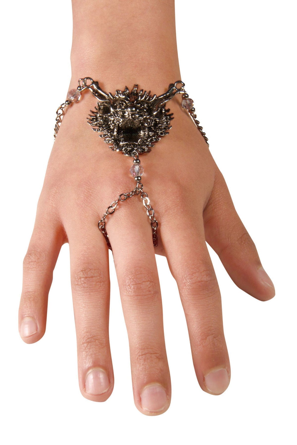 Silver finger bracelet hand chain with ornate Celtic-style design worn on hand