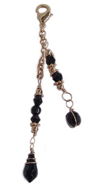Gold bead charm with black crystal beads for Hair Twisters and Spiral Hair Wraps, product view on white background.