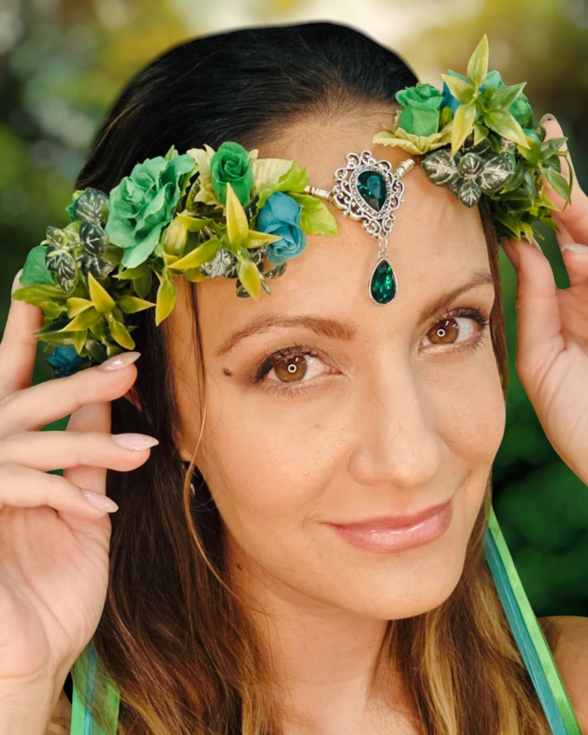 Floral crown headpiece with green gemstones worn as boho hair jewelry
