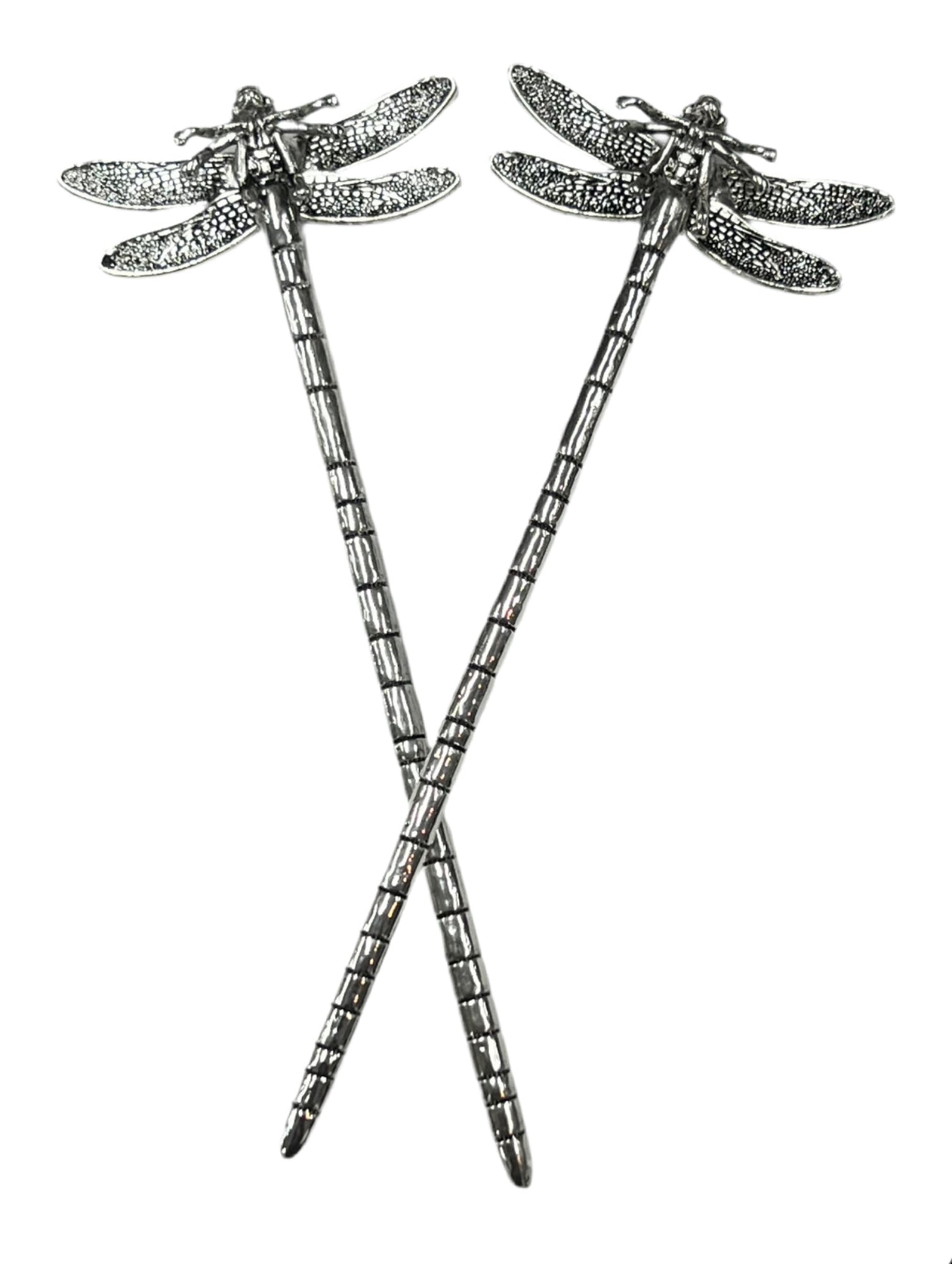Silver dragonfly hair sticks crossed together, front view