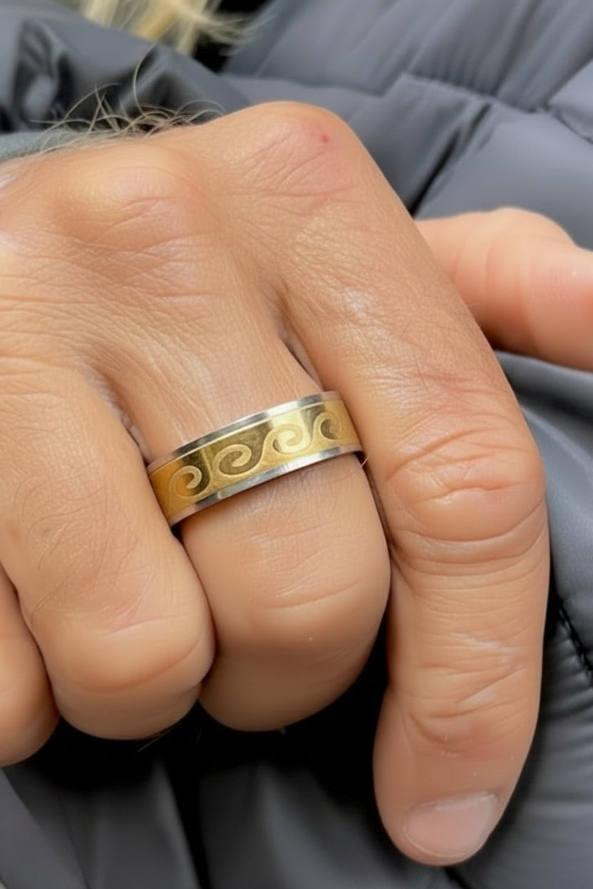 Wave ring with gold accent worn on finger