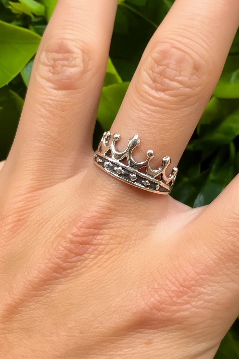 Model wearing sterling silver crown ring
