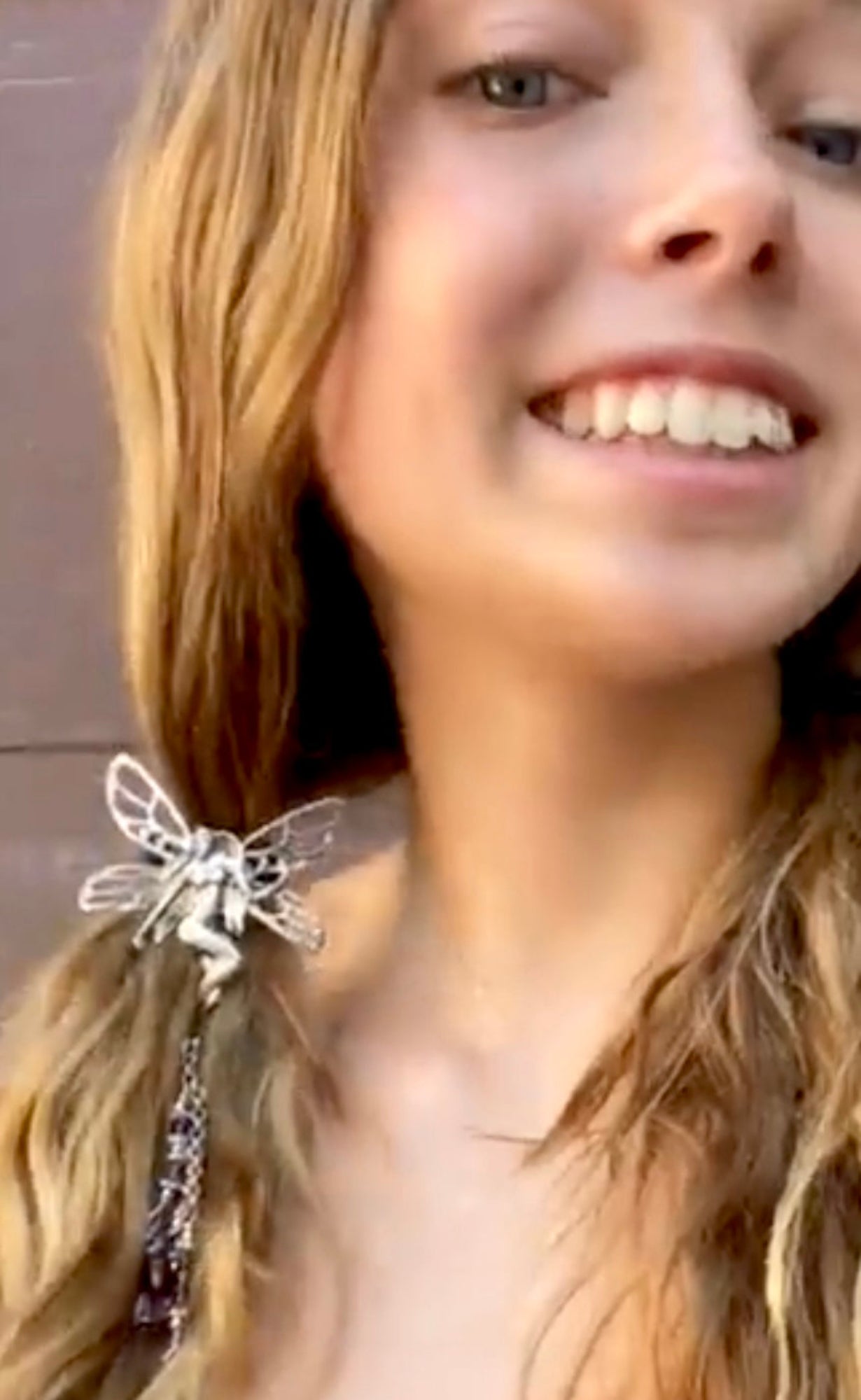 Woman wearing silver fairy hair hook with bead charms