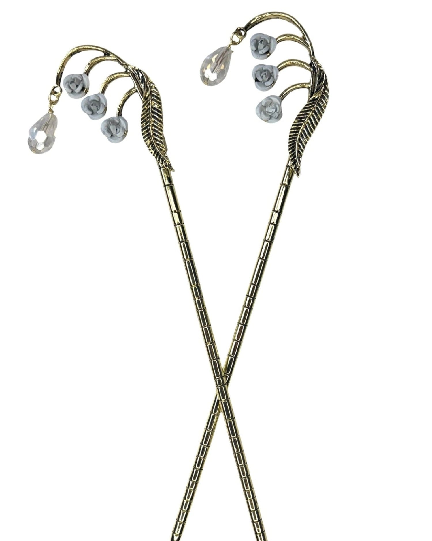 Gold Feather Hair Sticks featuring a feather design with white crystal drops, pair shown front view on a white background.