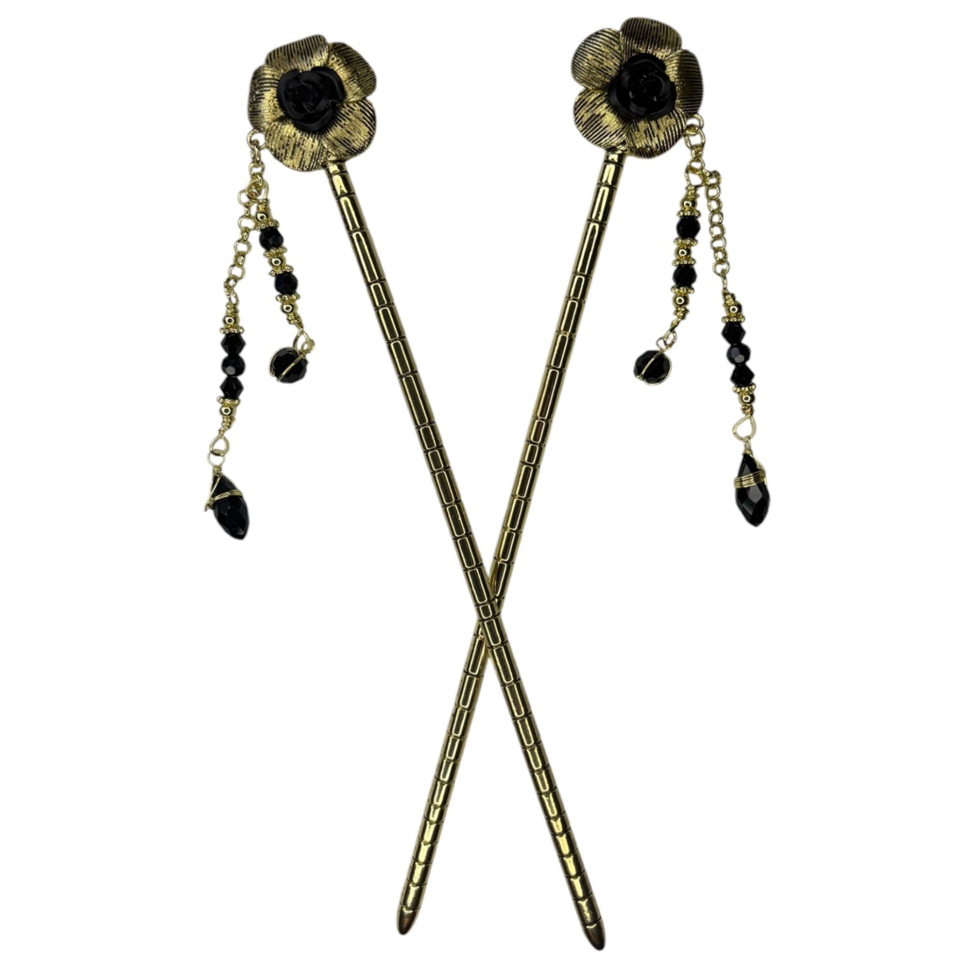 Pair of antique gold flower hair sticks with black rose centers and black crystal bead dangle chains, shown crossed on a white background to display the front view.
