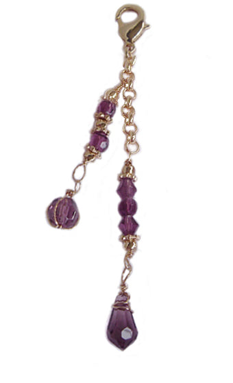 Gold bead charm with purple crystal beads for Hair Twisters and Spiral Hair Wraps, product view on white background.