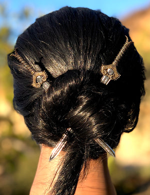 Model wearing Medieval Sword Hair Sticks - Unique Fantasy Hair Accessories for Women cosplay style