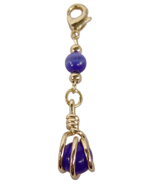 Blue bead hair charm with gold metal wrap and clasp for braids and Hair Twisters on white background