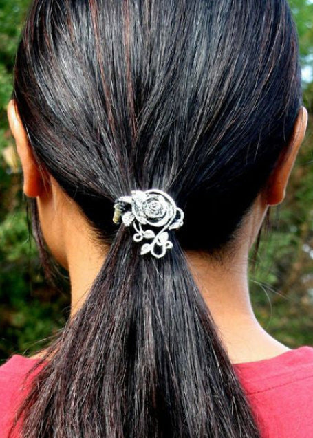 Model wearing Rose Hair Hook - Elegant Silver Ponytail Holder for Women