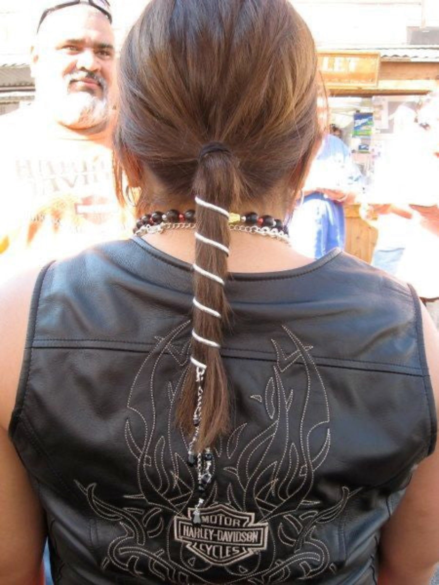 Silver 6-inch spiral ponytail wrap hair accessory, front view
