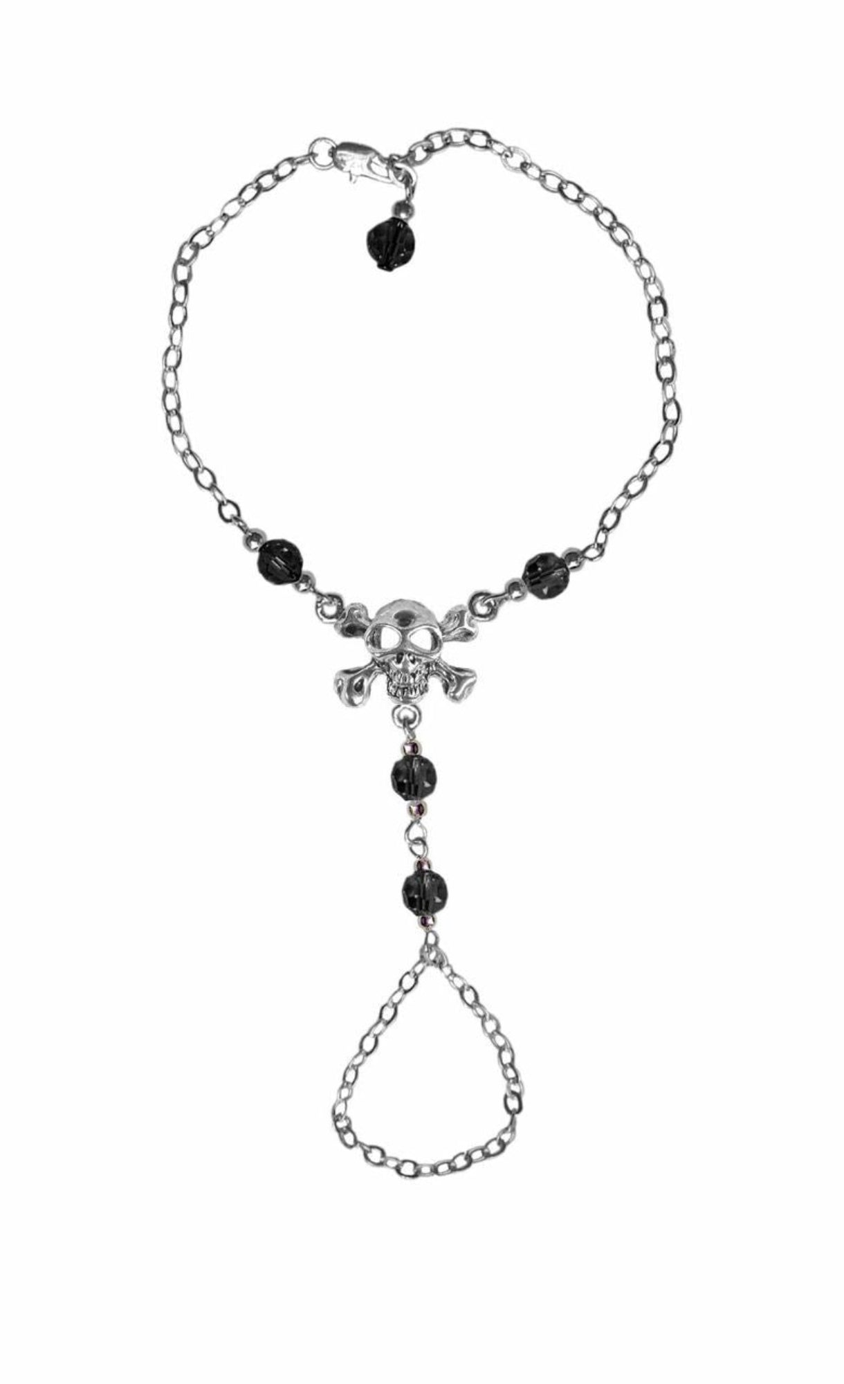 Silver skull and crossbones finger bracelet with chain-linked ring, front view
