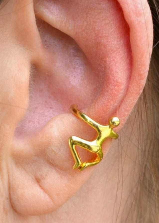 gold climbing man ear cuff worn on ear non piercing earring side view