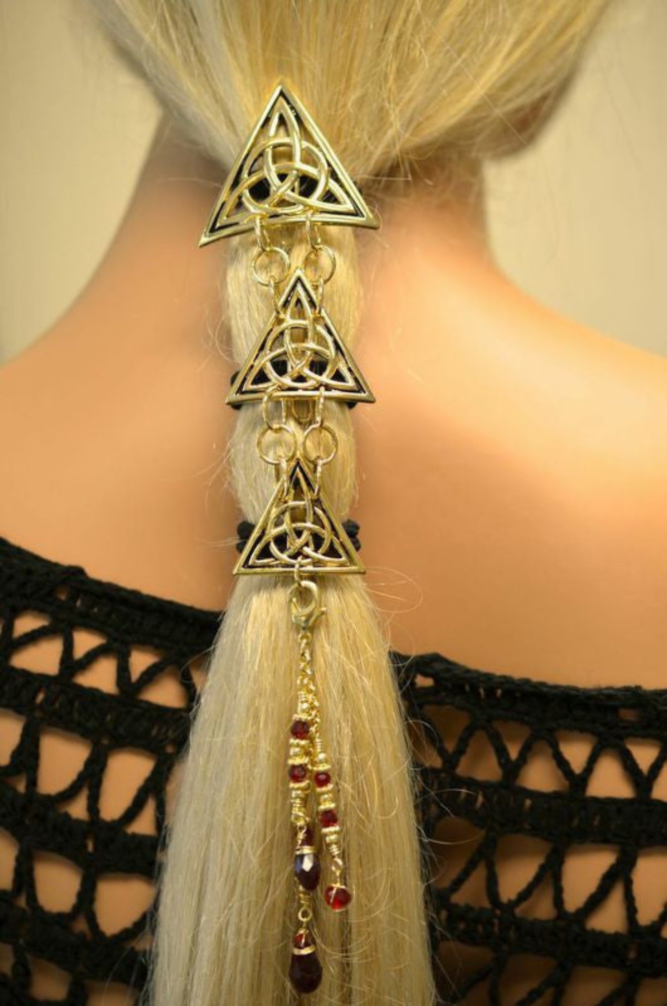 Gold Celtic triangle hair armor with linked pendants, back view