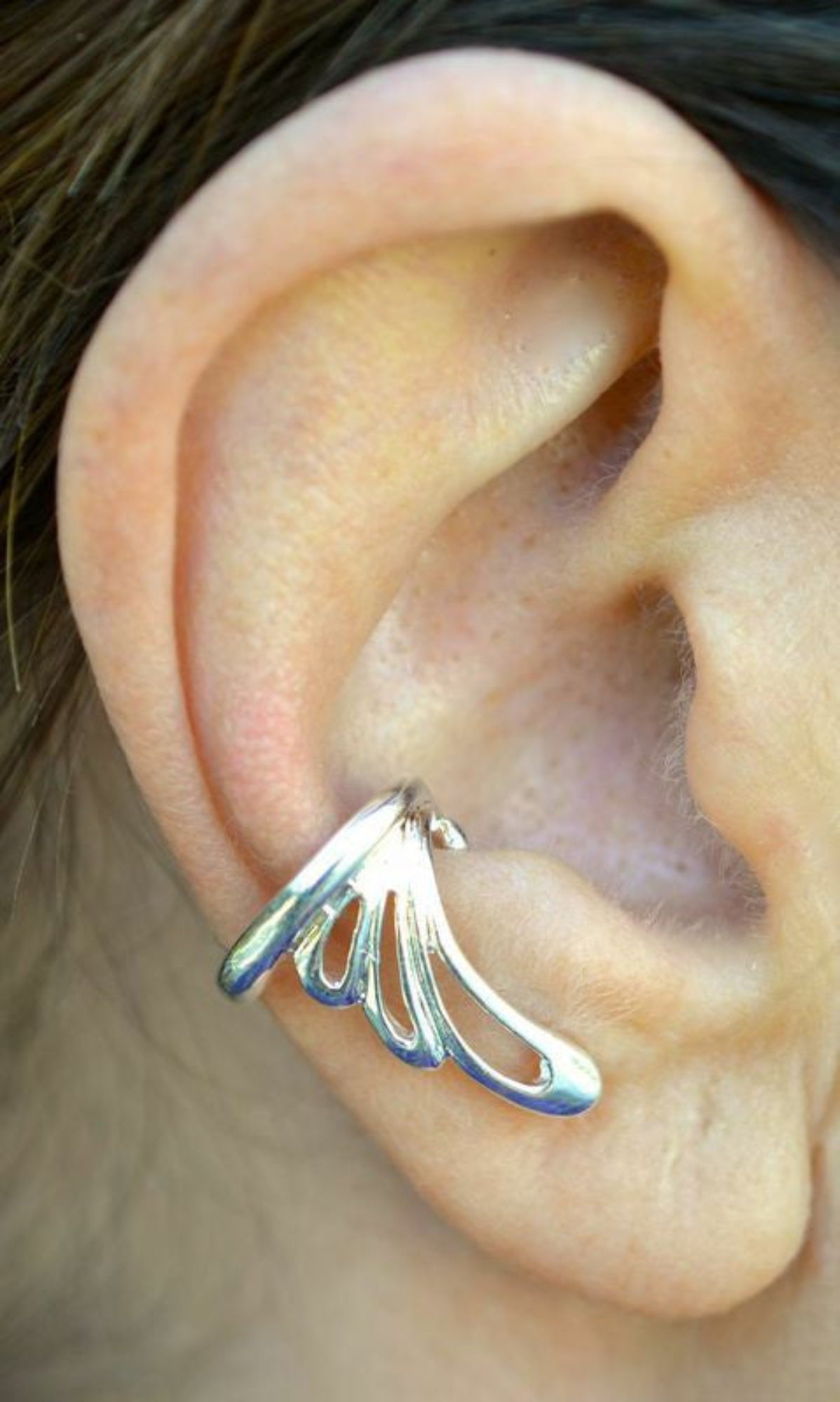 silver flowy wing ear cuff non piercing earring front view