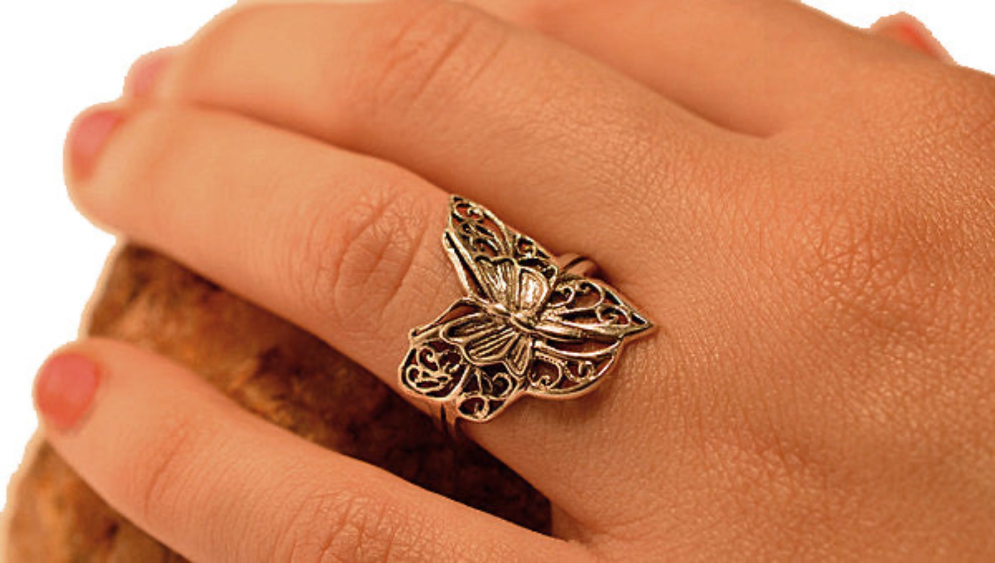 Model wearing sterling silver butterfly ring