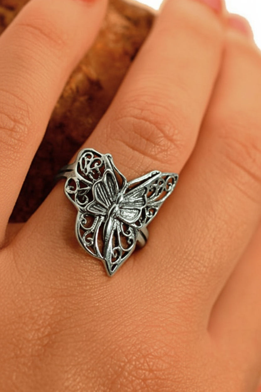 Model wearing sterling silver butterfly ring