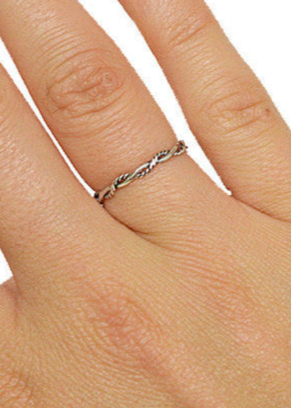 Model wearing Intertwined Rope Band Ring – Sterling Silver Elegant Twist
