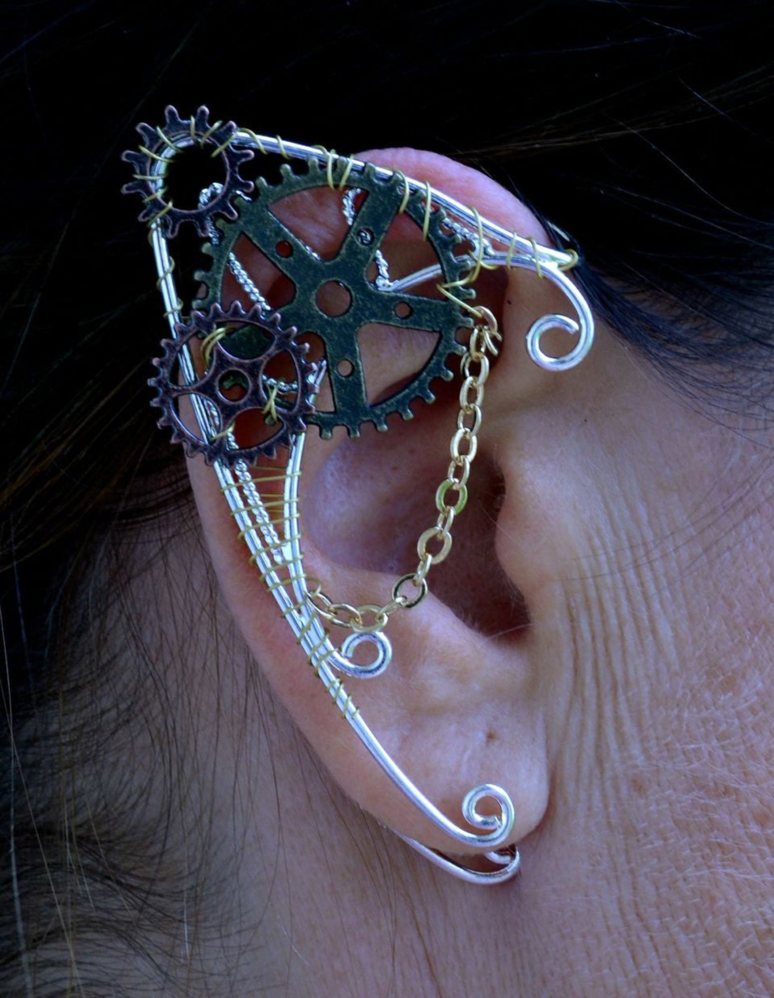 Model wearing steampunk gear elf ear cuff, adjustable, no piercing