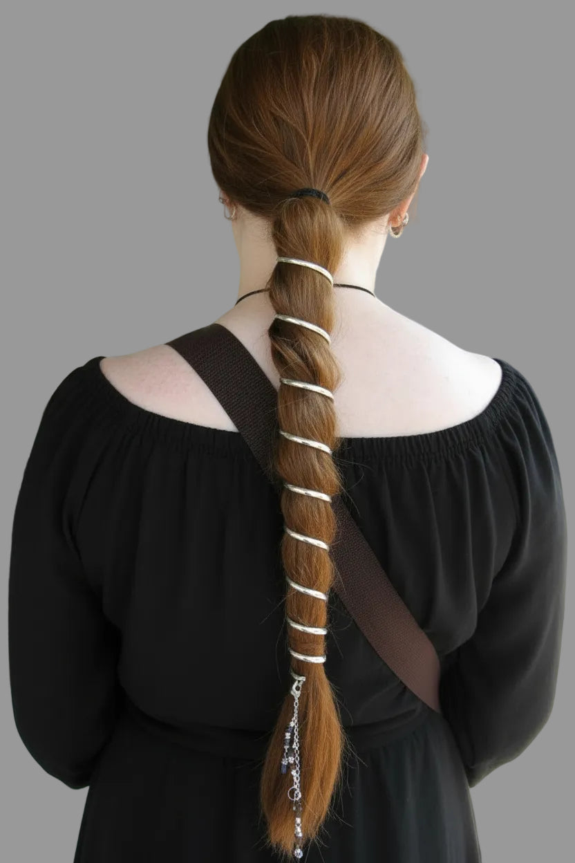 Model wearing 12-inch silver ponytail wrap hair accessory in festival setting