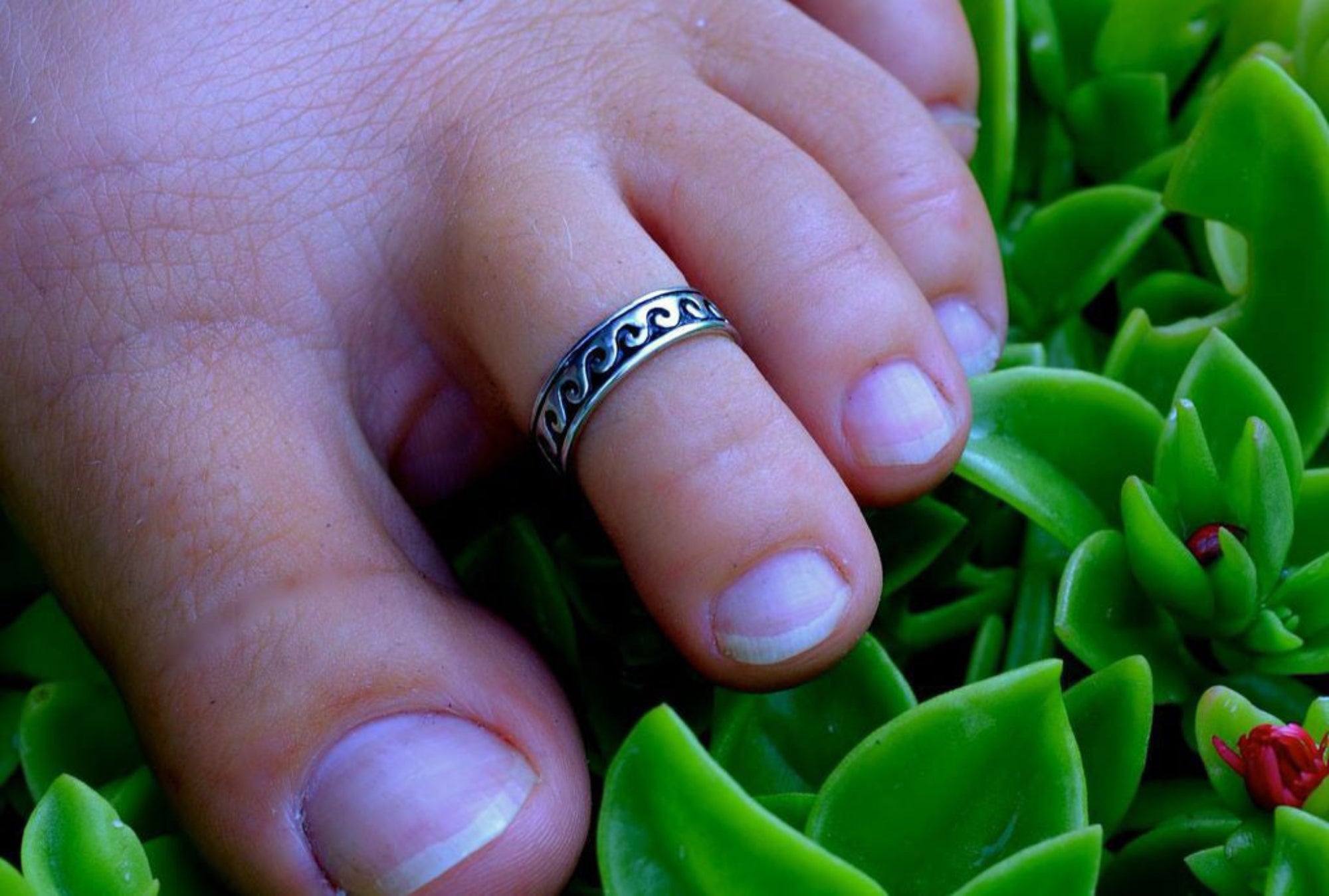 Wave toe ring with silver overlay worn on toe