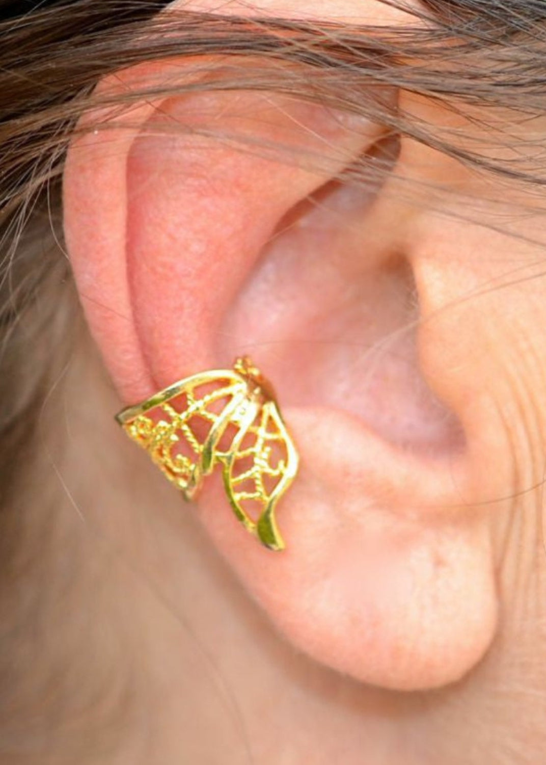 gold butterfly wing ear cuff non piercing earring front view