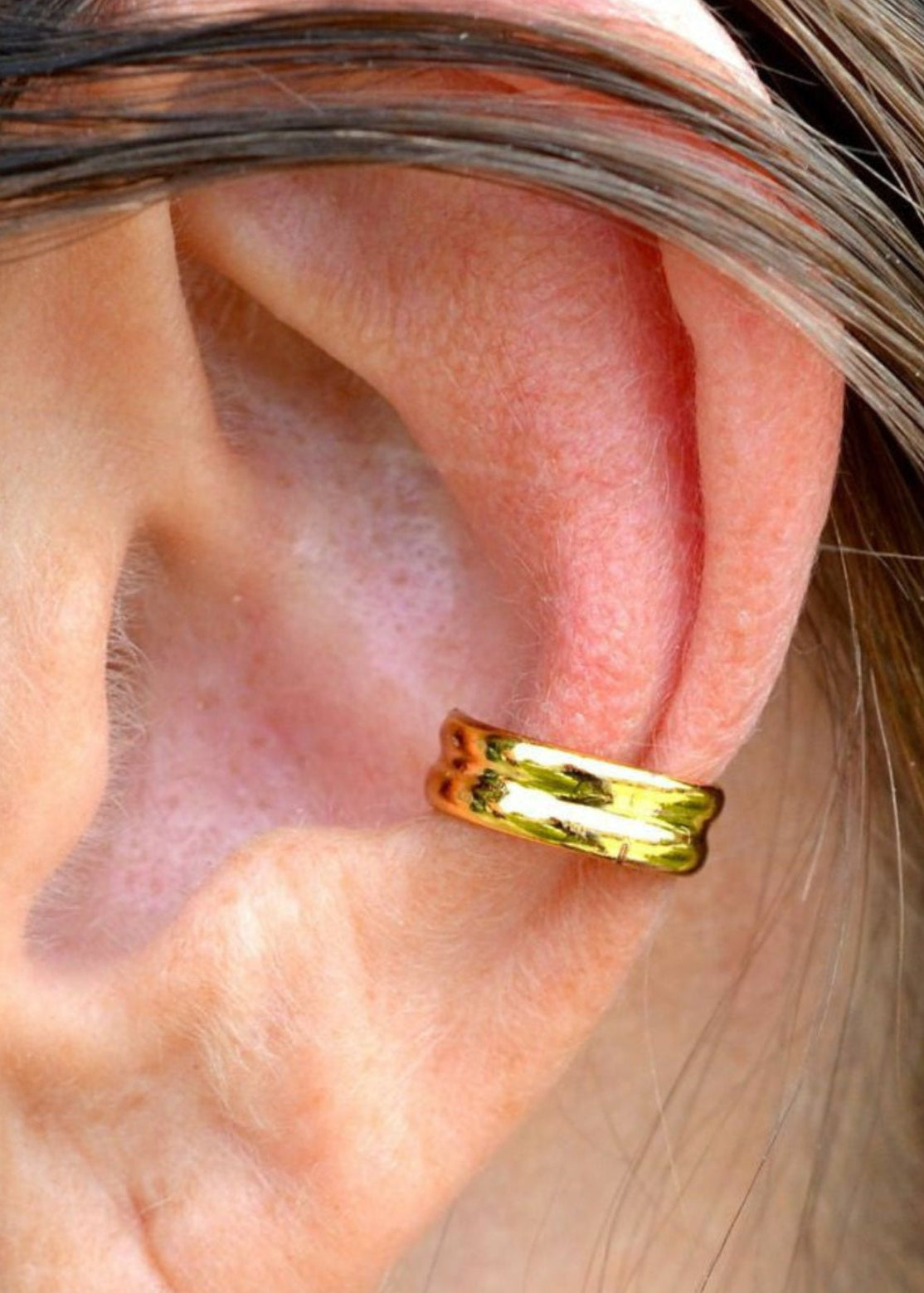 gold double band ear cuff worn on ear non piercing earring