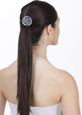 Model wearing Silver Celtic Hair Hook ponytail holder at rave, festival hair accessory.