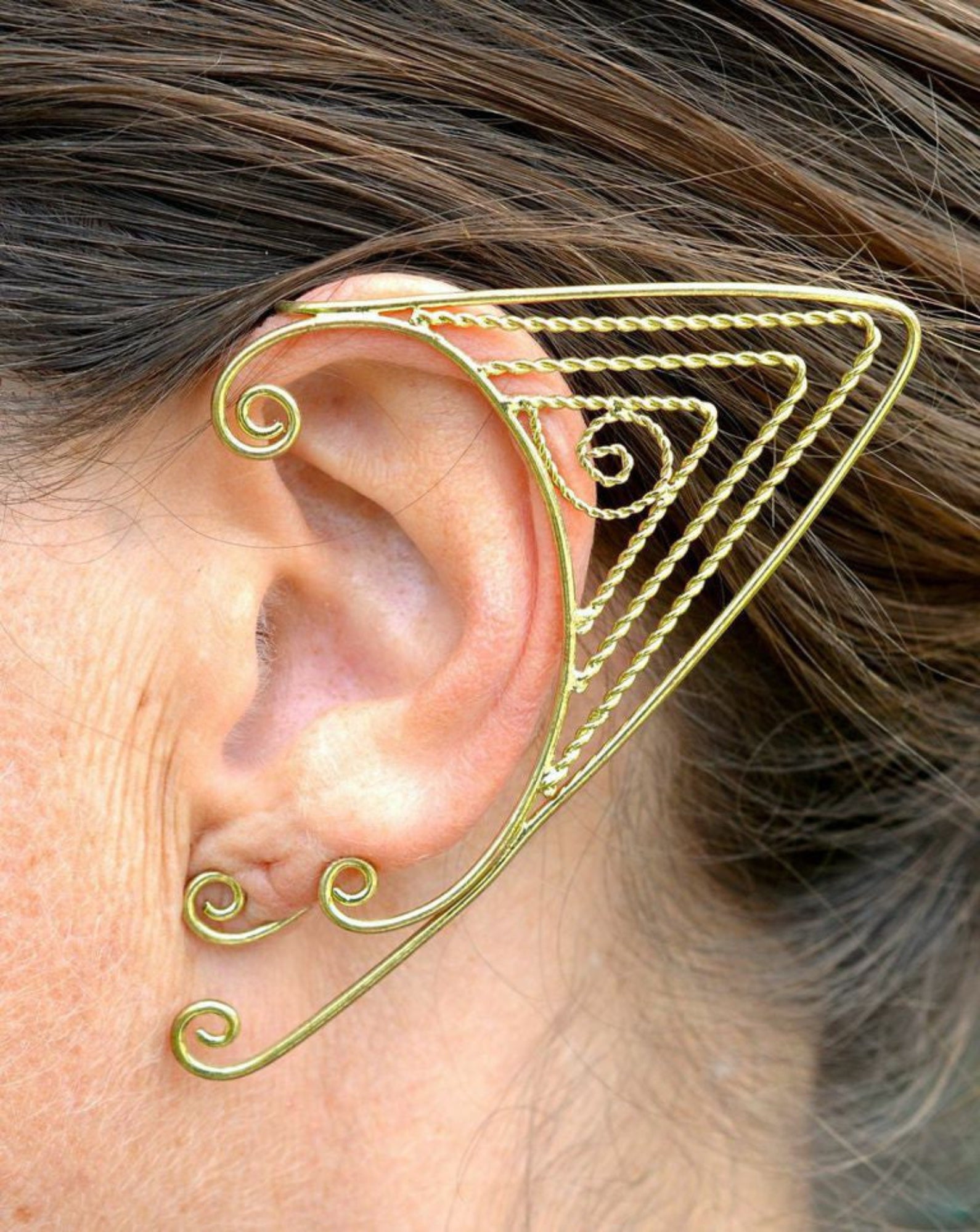 Gold triangle wire elf ear cuff worn on ear non piercing fantasy elven ear wrap jewelry side view
