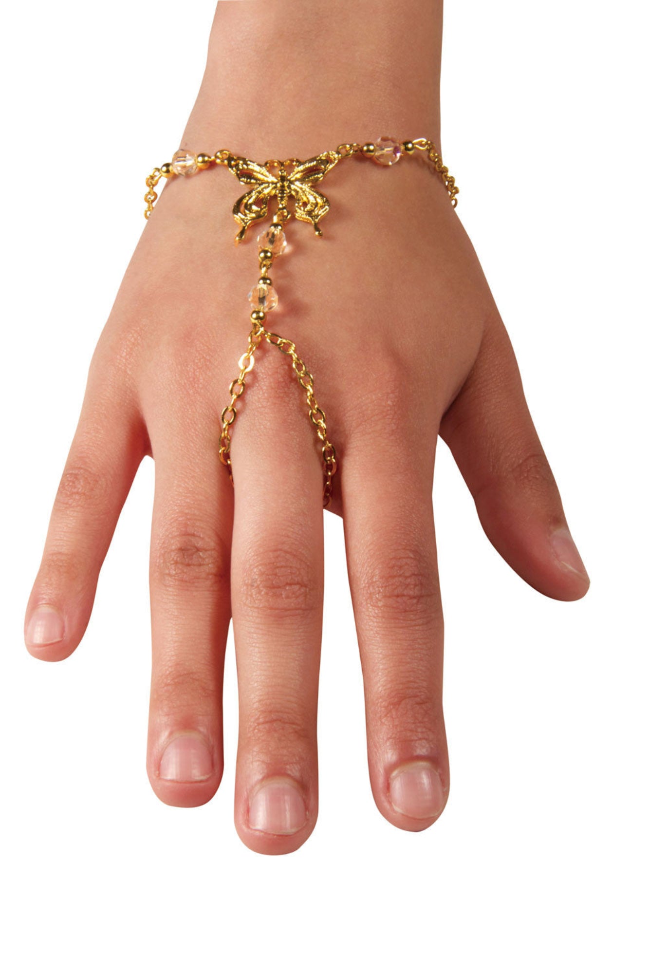 Gold butterfly hand chain finger bracelet with pink bead accents worn on hand