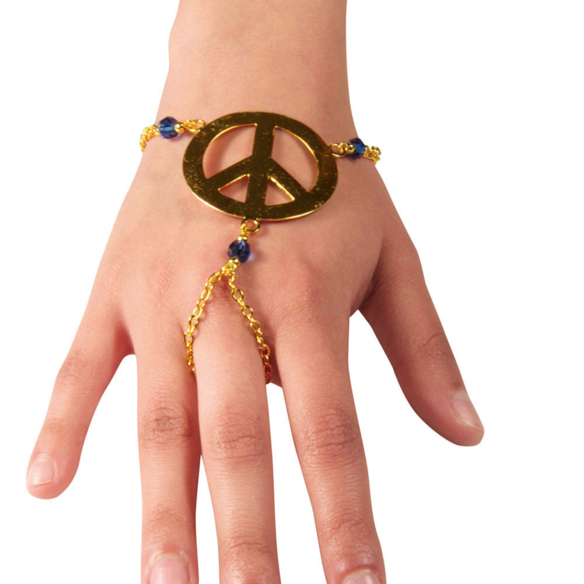 Gold peace symbol hand chain finger bracelet with blue bead accents worn on hand