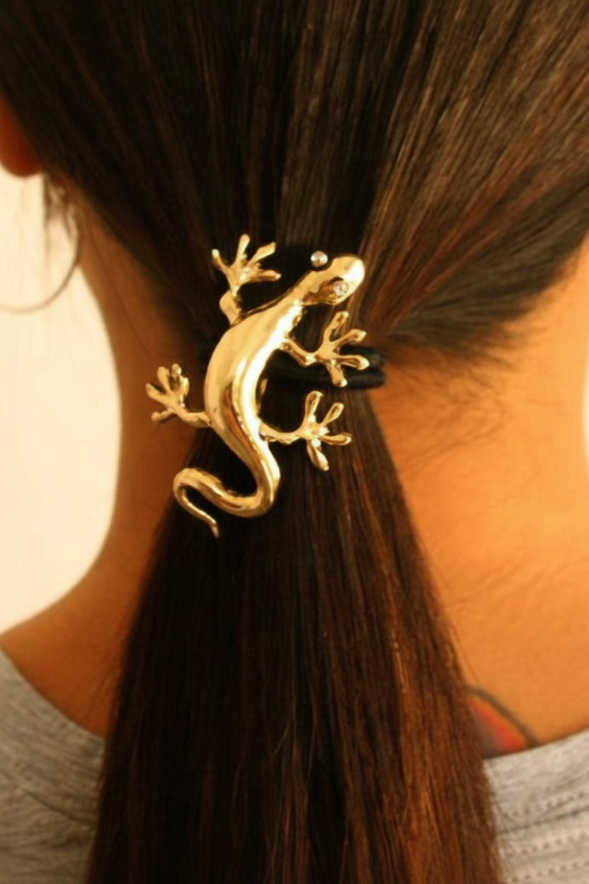Gold gecko ponytail hair hook securing ponytail, back view