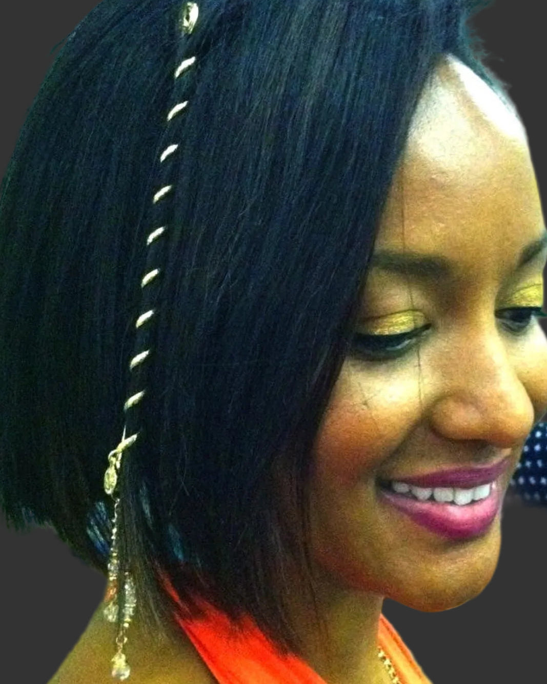 6 inch gold spiral hair twister worn in short hair, angled side view