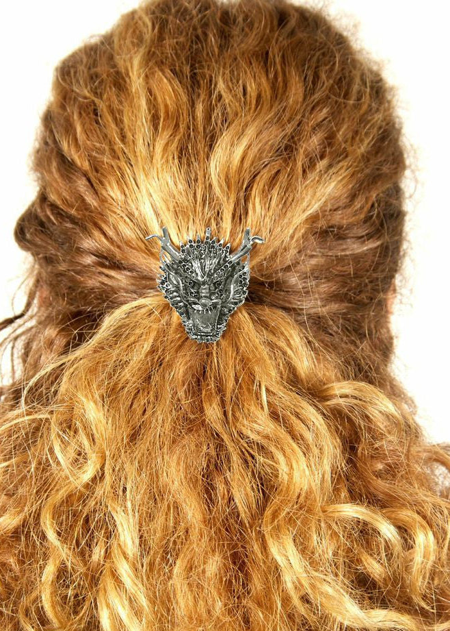 Model with Silver Dragon Hair Hook at music festival, fantasy ponytail accessory
