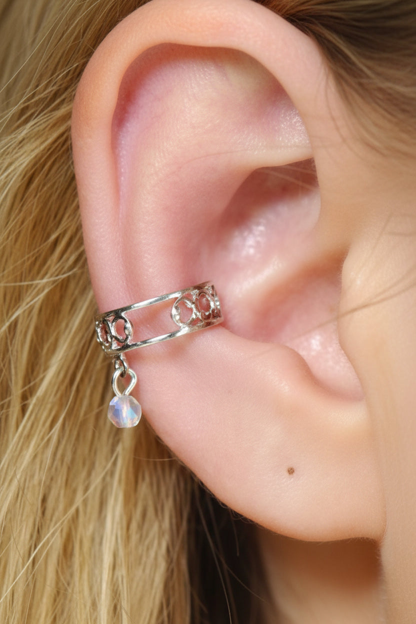 silver ear cuff with dangling blue bead non piercing adjustable jewelry front view
