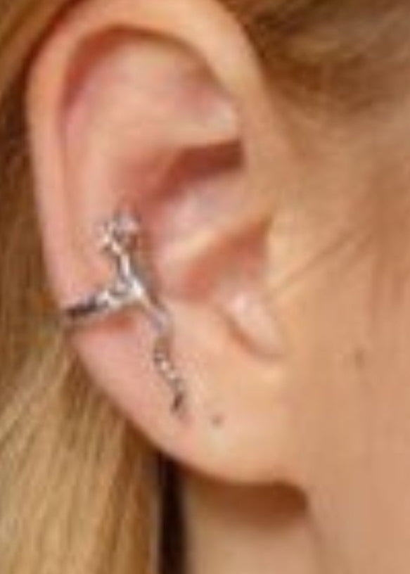 Silver gecko ear cuff non-piercing ear jewelry worn along outer ear cartilage, side view