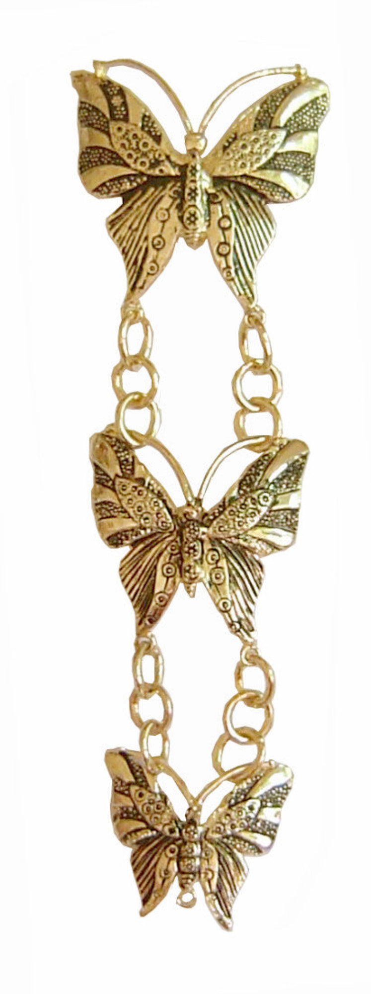 Gold butterfly hair hook with linked chain pendants, front view