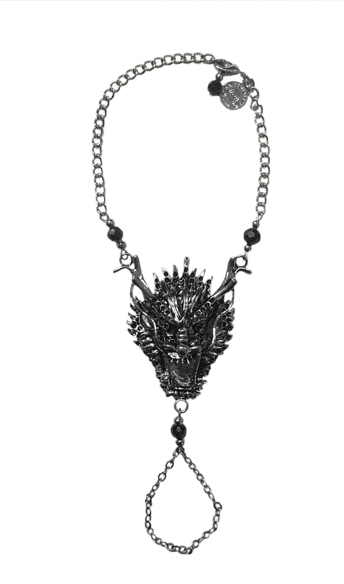 Dragon head hand chain finger bracelet with adjustable wrist chain and black bead accents, front view